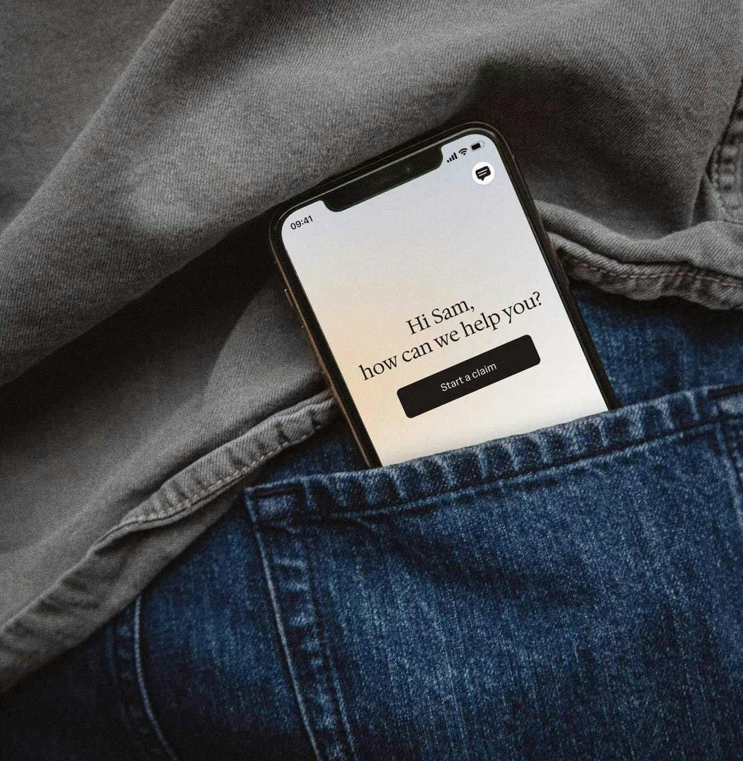 Insurance app in back pocket of jeans.